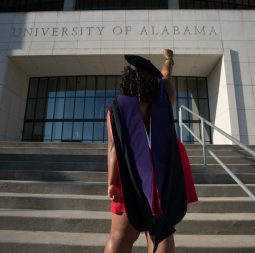 woman-standing-in-front-of-university-of-alabama-936003